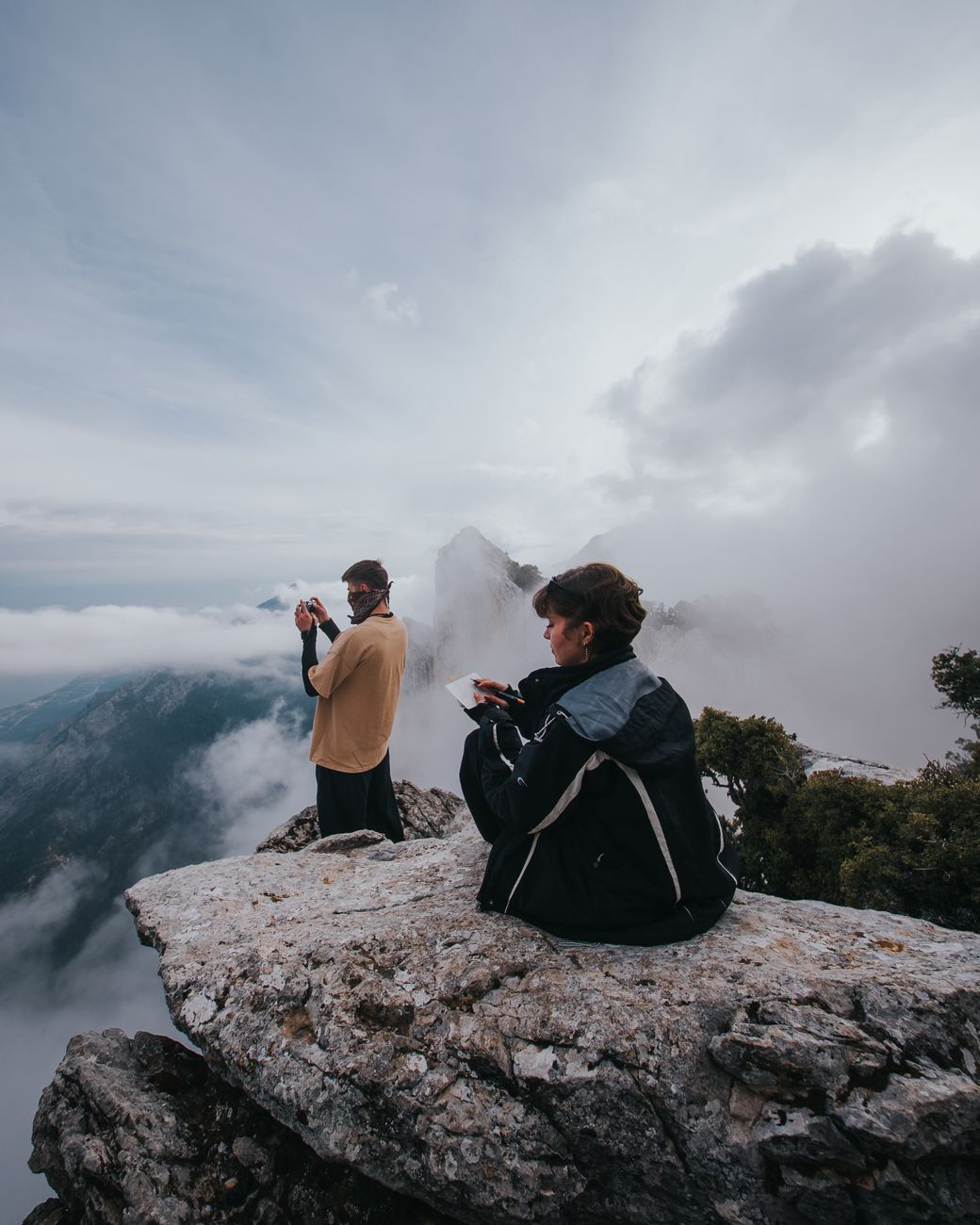 Travel writers taking notes outdoors